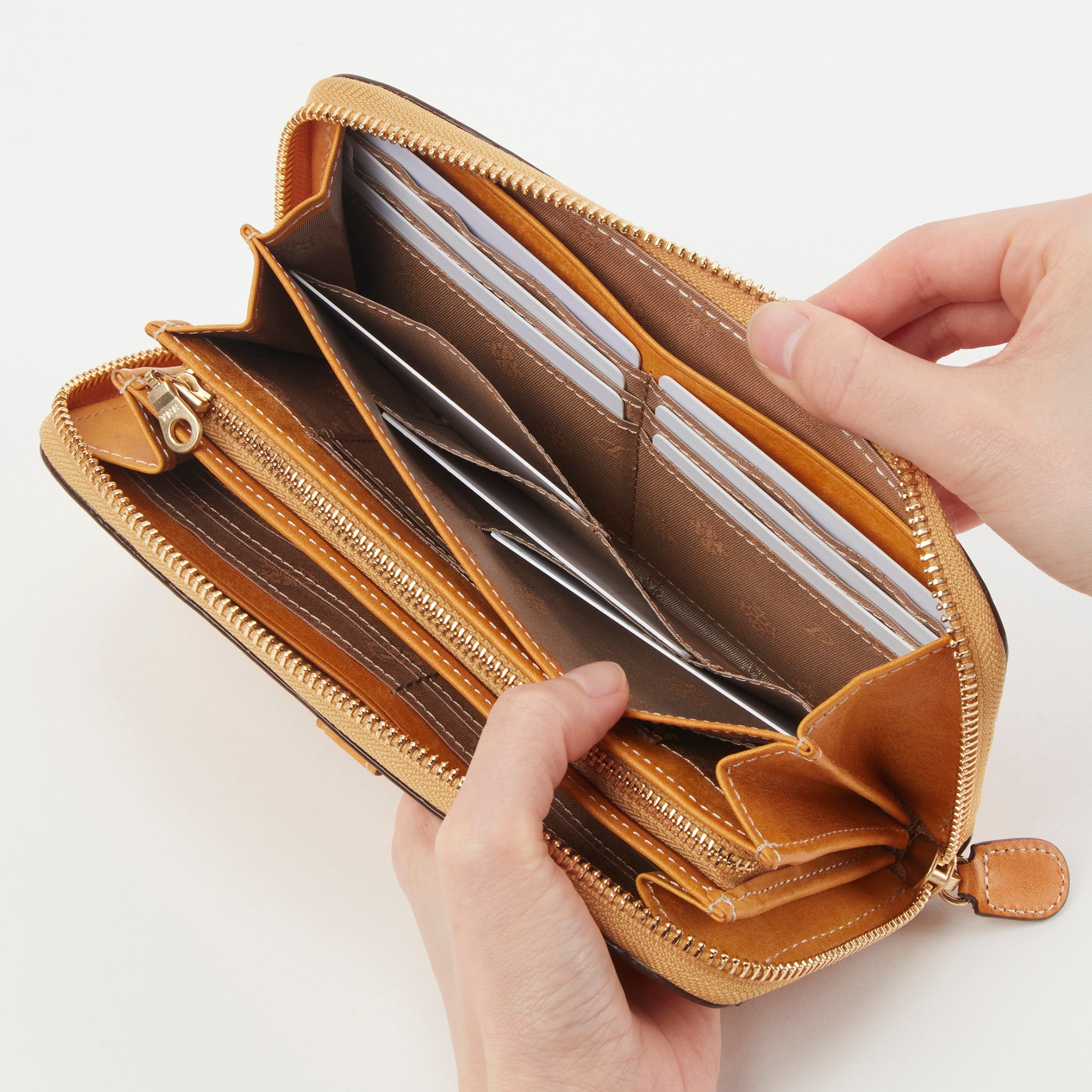 コラッジョ ラウンドファスナー長財布 0030942