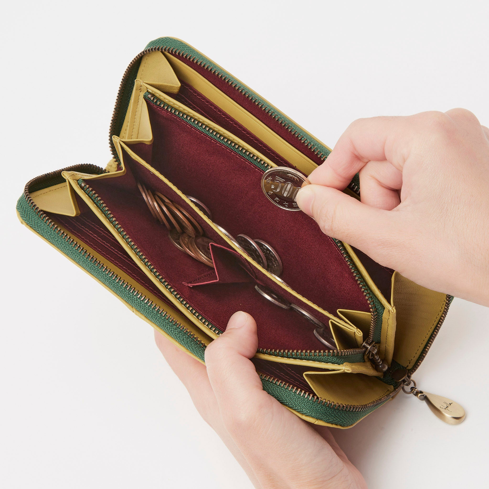 インビシブレ ラウンドファスナー長財布 5470573